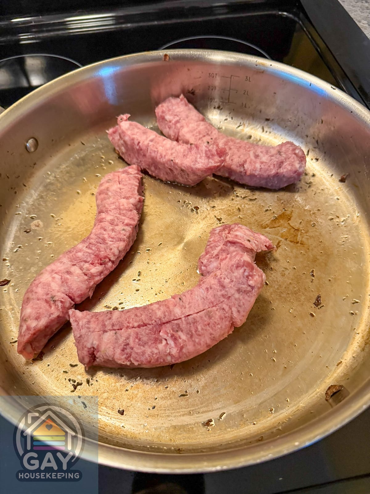 Sweet Italian sausage removed from its casings in a skillet