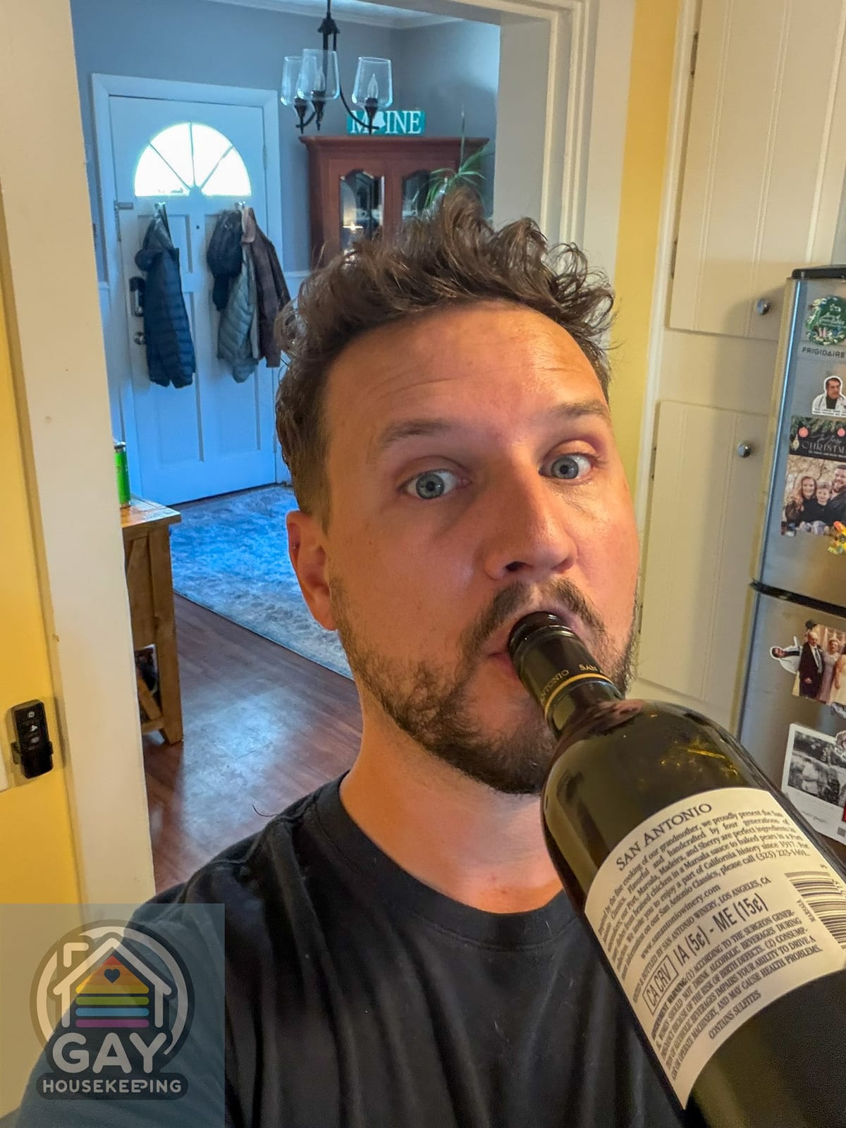 Brad tasting Marsala wine while making sausage and mushroom pasta